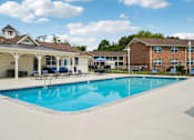 Thumbnail 21 of 40 - Resort-style swimming pool with sundeck at Reserve at Drakes Creek Apartments