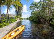 Thumbnail 11 of 13 - Wilton Tower apartments in Wilton Manors Florida photo of kayak on canal