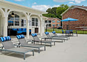 Thumbnail 23 of 40 - Resort-style swimming pool with sundeck at Reserve at Drakes Creek Apartments