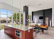 Thumbnail 20 of 29 - resident lounge with demonstration kitchen