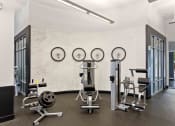 Thumbnail 19 of 29 - fitness center with weight machines