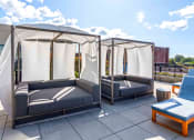 Thumbnail 38 of 46 - Covered cabanas on pool deck