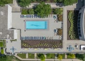 Thumbnail 36 of 46 - a birds eye view of a pool in the middle of a park