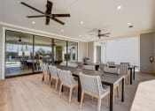 Thumbnail 44 of 56 - the dining room is open to the patio and pool