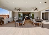 Thumbnail 45 of 56 - a large dining room and kitchen with a large table and chairs