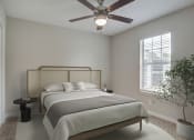 Thumbnail 11 of 27 - Place at Midway Douglasville GA apartments photo of  bedroom with ceiling fan