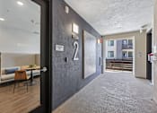 Thumbnail 22 of 41 - A hallway with a number 2 on the wall.