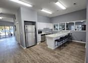 Thumbnail 8 of 17 - a kitchen and dining area in a new home