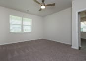 Thumbnail 8 of 25 - Pine Ridge Place Rental Home. Natural light and ceiling fan.