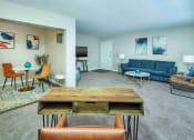 Thumbnail 9 of 40 - Grand Arbor Reserve Apartments in Raleigh, NC photo of a living room with a separated dining room