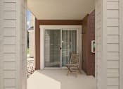 Thumbnail 24 of 47 - A patio with a chair and a sliding glass door.
