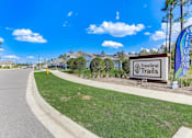Thumbnail 51 of 56 - a street with a sign that reads treeline trails