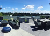 Thumbnail 12 of 36 - Rooftop patio with incredible views, fire-pit, barbecue grills, and lounge seating