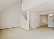 Thumbnail 10 of 48 - renovated living room with loft and stairs