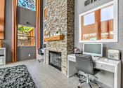 Thumbnail 6 of 13 - Madison at Black Mountain apartments photo of a Business Center with a fireplace