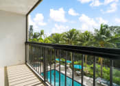 Thumbnail 7 of 13 - Wilton Tower apartments in Wilton Manors Florida photo of patio with view of beauitful pool