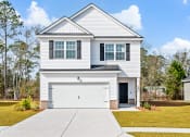 Thumbnail 1 of 28 - Blue Jay Commons Homes in Rincon, GA photo of home with attached garage