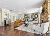 Thumbnail 43 of 48 - A stylish Hawks Landing clubhouse in Hickory NC with a fireplace and inviting lounge area