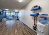 Thumbnail 12 of 20 - Yoga and wellness room at Idlewild 45 Apartments in Memphis TN with open space and fitness equipment