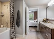 Thumbnail 9 of 16 - 33Hundred Apartments in Austin Texas photo of modern bathroom with view of bedroom