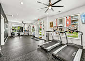 Thumbnail 3 of 48 - A spacious Hawks Landing fitness center in Hickory NC featuring treadmills and modern exercise equipment
