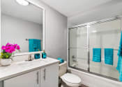 Thumbnail 6 of 13 - Wilton Tower apartments in Wilton Manors Florida photo of bathroom with sliding glass shower doors