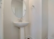 Thumbnail 10 of 20 - a bathroom with a sink and a mirror