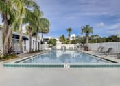 Thumbnail 2 of 15 - Derby Park Apartments in Daytona Beach, FL photo of resort-style pool