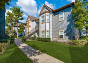 Thumbnail 15 of 20 - Outside of Breakwater Bay apartments with pathway for walking