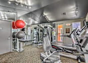 Thumbnail 3 of 13 - Madison at Black Mountain apartments photo of a updated fitness center