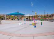Thumbnail 35 of 41 - Skye Canyon, NV Townhomes Near Centennial Hills - Banyan Brighton - Swimming Pool with Lounge Chairs
