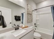 Thumbnail 23 of 56 - our apartments offer a bathroom with a tub