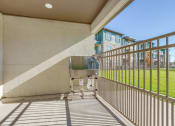 Thumbnail 28 of 34 - the retreat at thousand oaks balcony with grill and grass