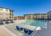 Thumbnail 1 of 34 - our apartments have a resort style pool with lounge chairs