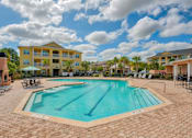 Thumbnail 17 of 32 - Hinesville, GA Apartments – Tattersall Village - resort style swimming pool and sundeck