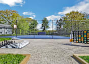 Thumbnail 33 of 48 - A playground with a chess set on the ground.