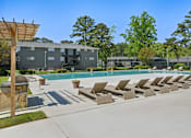 Thumbnail 2 of 20 - Pet-friendly Marietta apartments with large outdoor swimming pool and sun deck