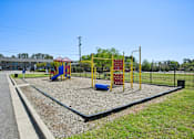 Thumbnail 4 of 20 - On-site playground at Amber Grove Apartments, family-friendly affordable housing in Marietta GA