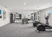 Thumbnail 26 of 40 - 24-hour fitness center with cardio machines and free weights at Hendersonville TN apartments