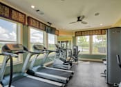 Thumbnail 3 of 32 - Pet-Friendly Apartments in Hinesville, GA – Tattersall Village - fitness center with cardio equipment