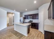 Thumbnail 13 of 24 - Renovated Kitchen at Amber Pines at Fosters Ridge, Conroe