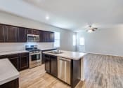 Thumbnail 7 of 24 - Sink With Faucet In Kitchen at Amber Pines at Fosters Ridge, Texas