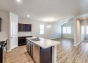 Thumbnail 10 of 24 - Modern Kitchen With Custom Cabinet at Amber Pines at Fosters Ridge, Conroe