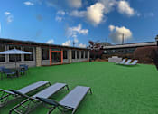 Thumbnail 32 of 51 - A sunny day at the outdoor seating area with tables and chairs.