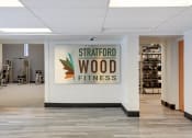 Thumbnail 14 of 14 - Stratford Wood Apartments and Townhomes in Minnetonka, MN Photo of Stratford Wood Fitness center sign