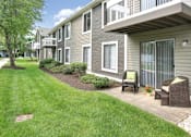 Thumbnail 27 of 28 - Grassy Outdoor Exterior of Patio