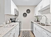 Thumbnail 8 of 28 - Kitchen with Hardwood Floors