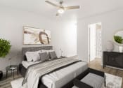 Thumbnail 3 of 28 - Addison Lane Apartment homes in Gainesville Florida photo of a bedroom with a bed and a ceiling fan