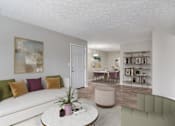 Thumbnail 1 of 12 - Affinitee at Pine Lake Apartments in Pine Lake, GA photo of a living room and dining room with a white couch and a table