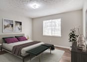 Thumbnail 5 of 12 - Affinitee at Pine Lake Apartments in Pine Lake, GA photo of a bedroom with a bed and a window